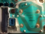 screws holding circuit board.jpg